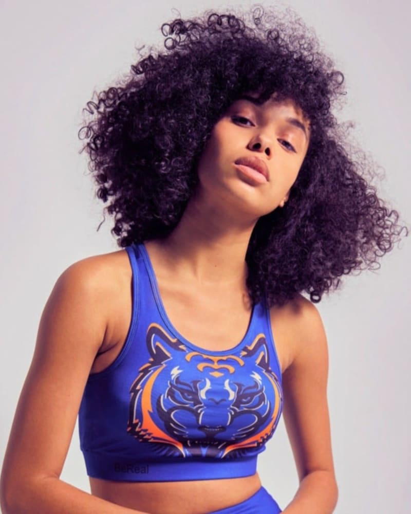 Front of a model wearing a size Small Tigress Sports Bra in Blue by BeReal. | dia_product_style_image_id:304592